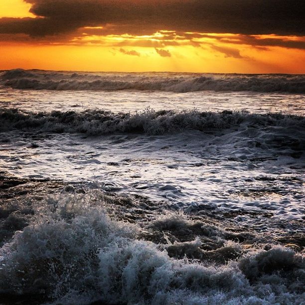 sea, sunset, water, scenics, horizon over water, beauty in nature, sky, orange color, wave, tranquil scene, tranquility, nature, idyllic, surf, beach, cloud - sky, shore, motion, dramatic sky, seascape