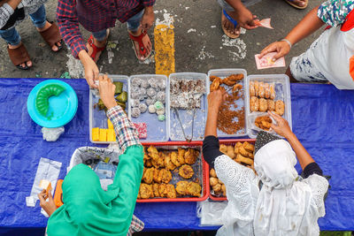 High angle view of people at food