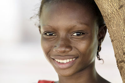 Close-up portrait of smiling boy