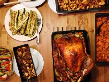 Directly above view of fresh thanksgiving dinner served on table