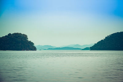 Scenic view of sea against clear sky