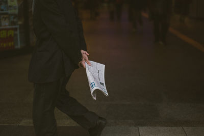 Man holding umbrella