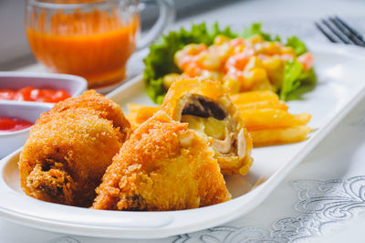 Close-up of food in plate on table