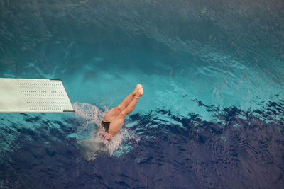 Man swimming in sea