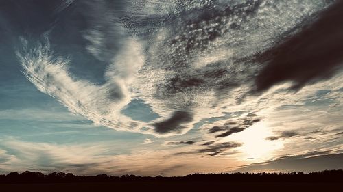 Low angle view of dramatic sky during sunset