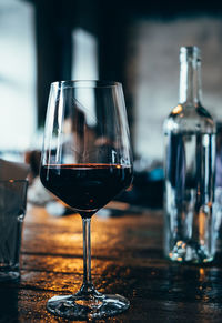 Close-up of wine bottles on table