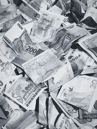 High angle view of clock on paper