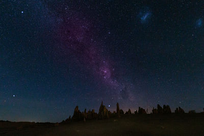 Low angle view of stars in sky at night