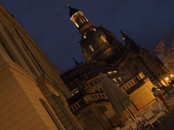 Low angle view of buildings in city against sky