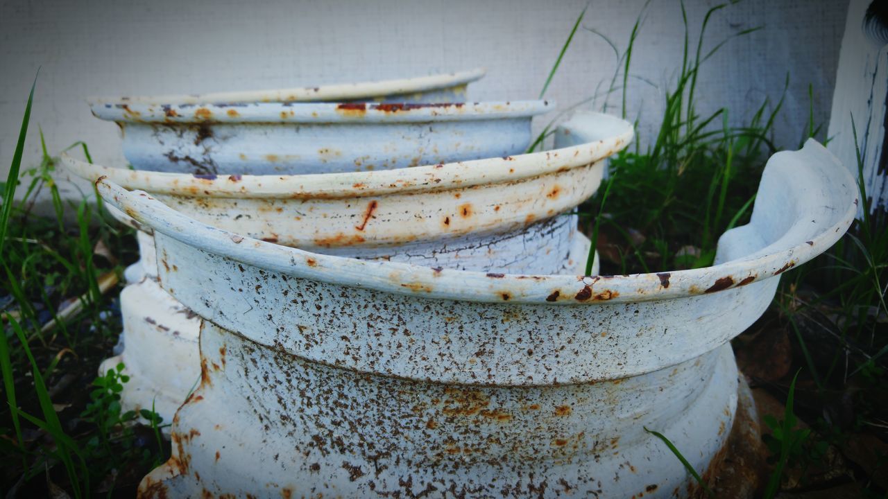 nautical vessel, moored, boat, abandoned, water, transportation, damaged, mode of transport, obsolete, old, close-up, run-down, outdoors, day, deterioration, no people, wood - material, weathered, high angle view, nature