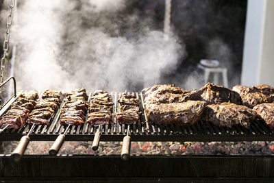 Preparation of red meat in bbq. raw red meat high qualty food for social events like wedding