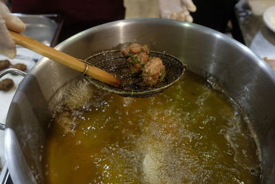 Close-up of food being deep fried in cooking oil