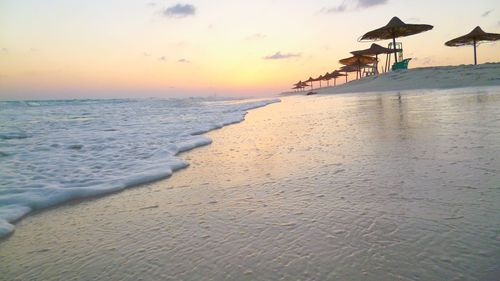 Scenic view of beach during sunset