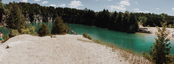 Scenic view of lake against trees in forest