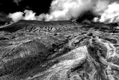 Panoramic view of volcanic landscape against sky