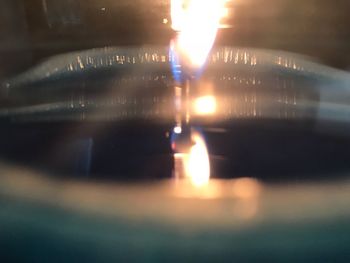 Close-up of burning candle