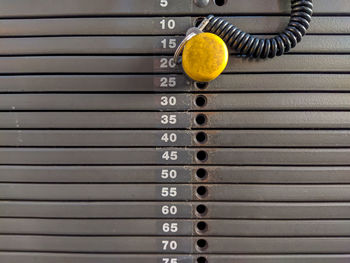 High angle view of yellow balls on wooden floor