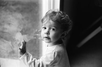 Portrait of cute boy looking away