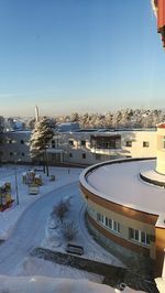 High angle view of river in city during winter