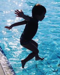 Man swimming in pool