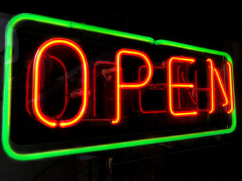 Close-up of illuminated neon sign at night