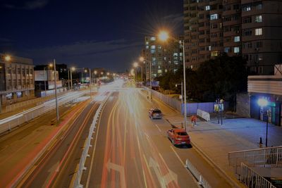 Light trails on city street at night