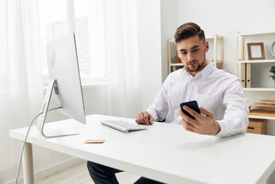 Young man working at office