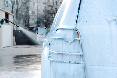 Car washing with pressure washer