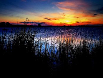 Scenic view of sea at sunset