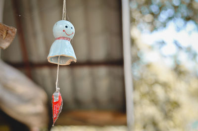Close-up of stuffed toy hanging