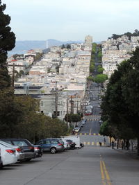 Cars on road in city