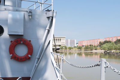 Boat on river against sky