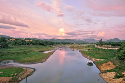 High angle view of river against sky during sunset