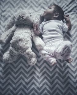 Cute baby sleeping in bed