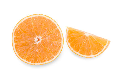 Close-up of orange slices over white background