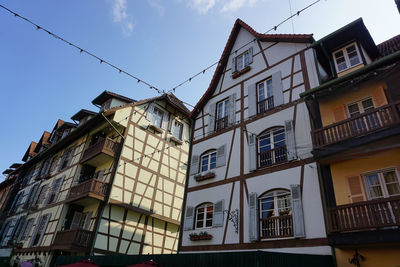 Low angle view of residential building against sky