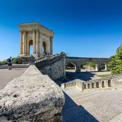View of historic building against clear blue sky