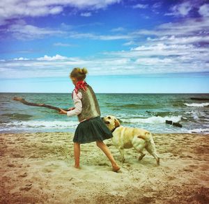 Woman standing on beach