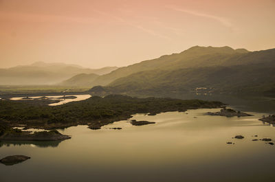 Scenic view of mountains at sunset