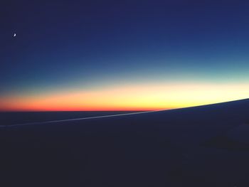 Scenic view of sea against sky at sunset