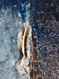 Full frame shot of rock on sea shore