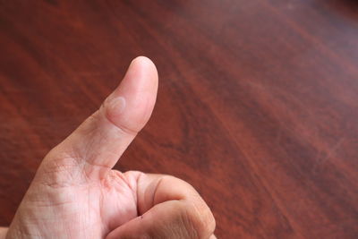 High angle view of person feet in glass