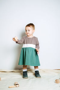 Baby fashion. unisex color clothes for babies. cute baby girls in neutral color palette cotton