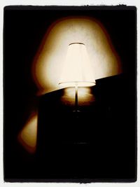 Illuminated lamp in dark room