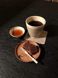 High angle view of coffee cup on table