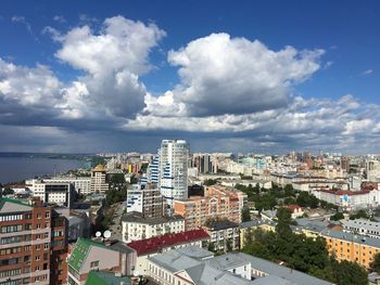 High angle view of buildings in city against sky