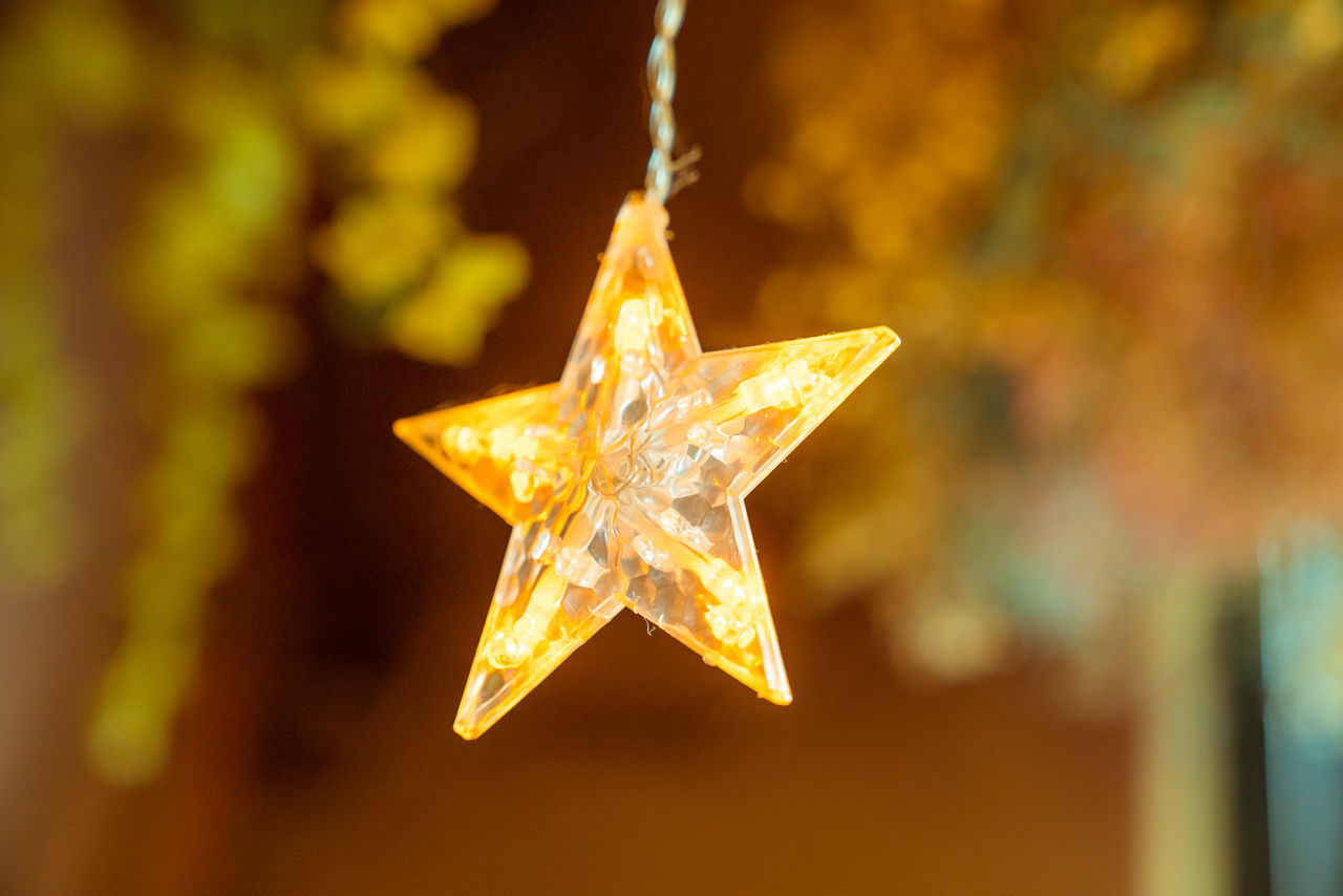 CLOSE-UP OF ILLUMINATED CHRISTMAS DECORATION