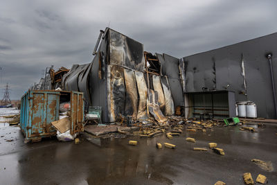 Outside the store, which was bombed, was looted by russian soldiers, occupiers.