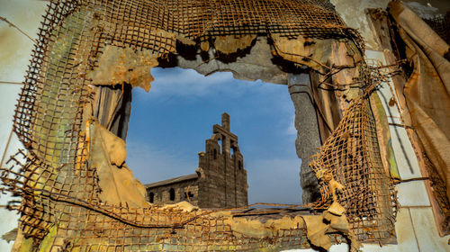 Low angle view of old cathedral against sky