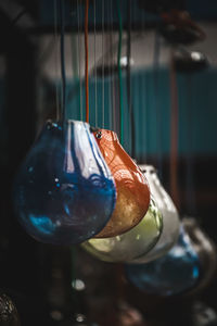 Close-up of glass decoration hanging at store